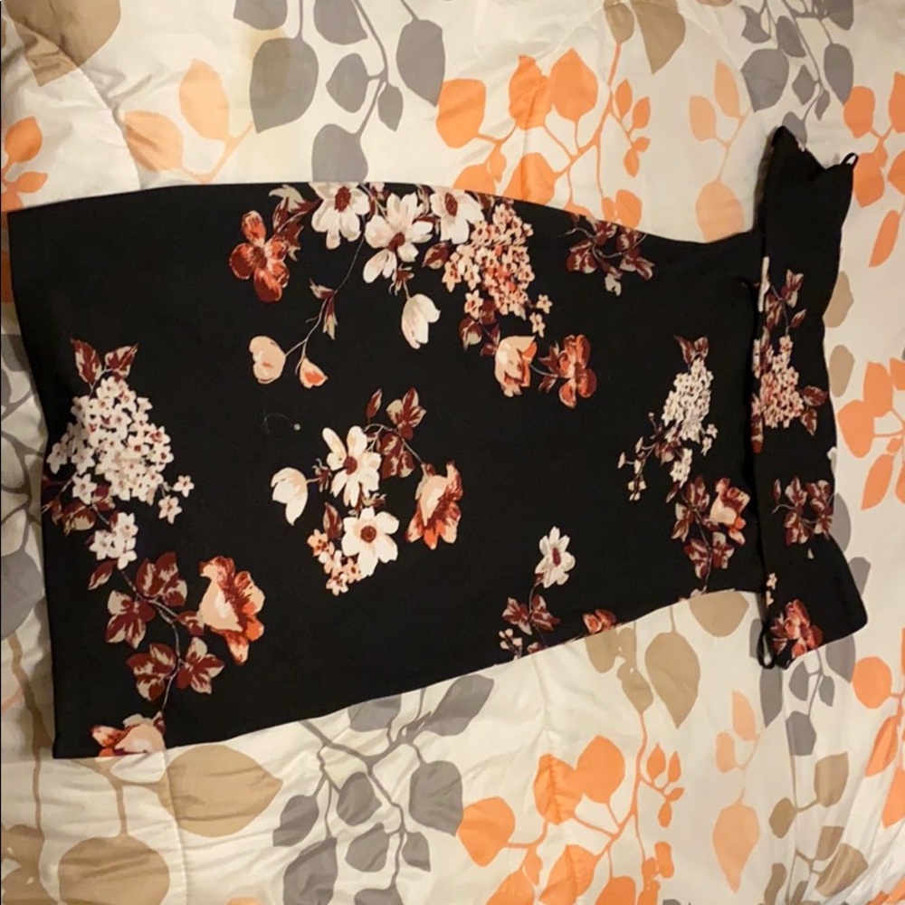 Black off the shoulder flower dress.